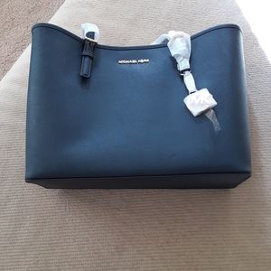 New without tag, Michael Kors travel jet tote bag